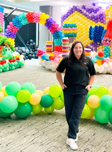 Jenny Porter at a large colourful balloon installation